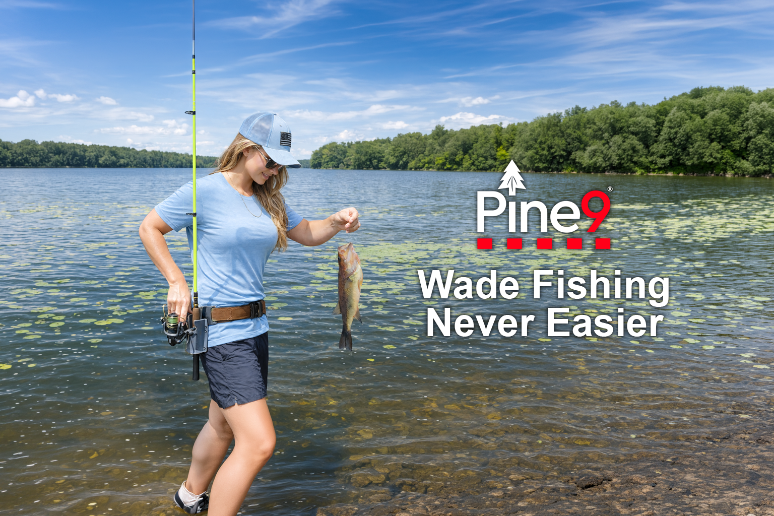 Pine 9 Fishing Rod Holster JettyHawk for Hands free fishing, woman holstering fishing rod getting ready to unhook a fish