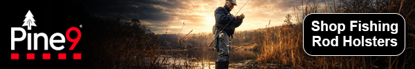 Pine 9 JettyHawk Fishing Rod Holster and Holder Hip Mounted angler standing in shallow shoreline water tying lure at sunset with tall grass and calm lake featuring Pine 9 branding and shop fishing rod holsters call to action