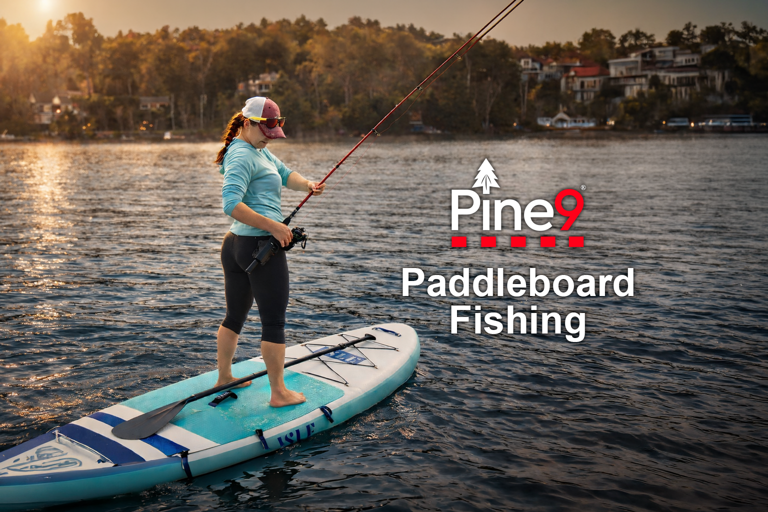 pine 9 JettyHawk fishing rod holster hands free hip rod hip holder girl standing on paddleboard fishing for ass fish while holstering her rod