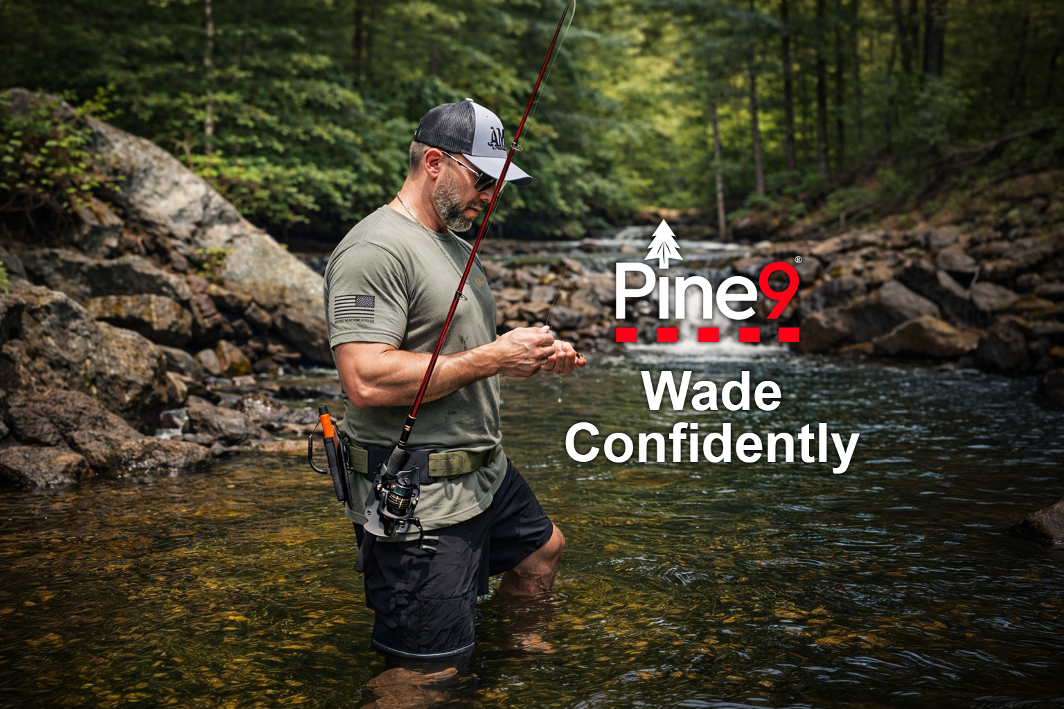 pine 9 JettyHawk fishing rod holster hands free hip rod hip holder man is wade fishing in a stream holding his lure and tying fishing line