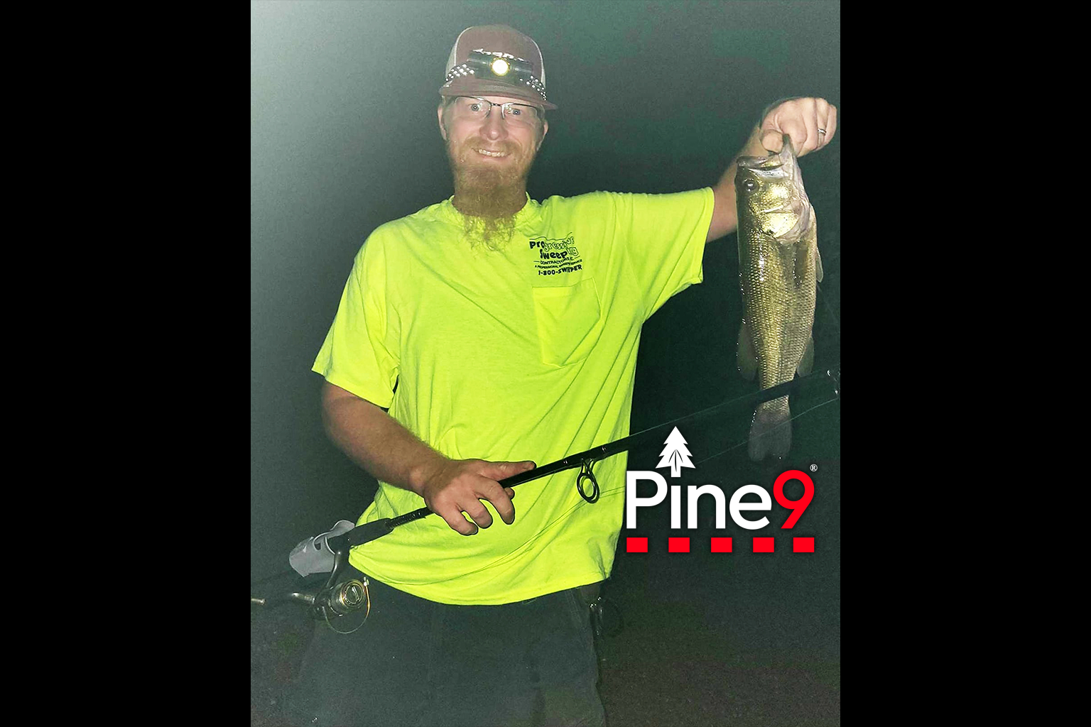 pine 9 JettyHawk fishing rod holster hands free hip rod hip holder man holding bass fish at night in the dark with his rod holstered