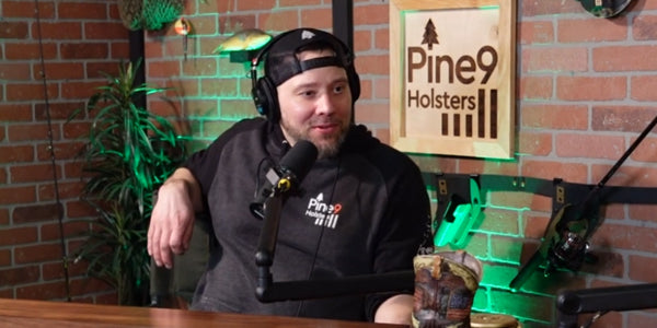 Pine 9 JettyHawk fishing rod holster founder discussing rod management solutions during podcast recording with Pine 9 Holsters branding in studio environment explaining secure fishing rod placement and angler problem solving design